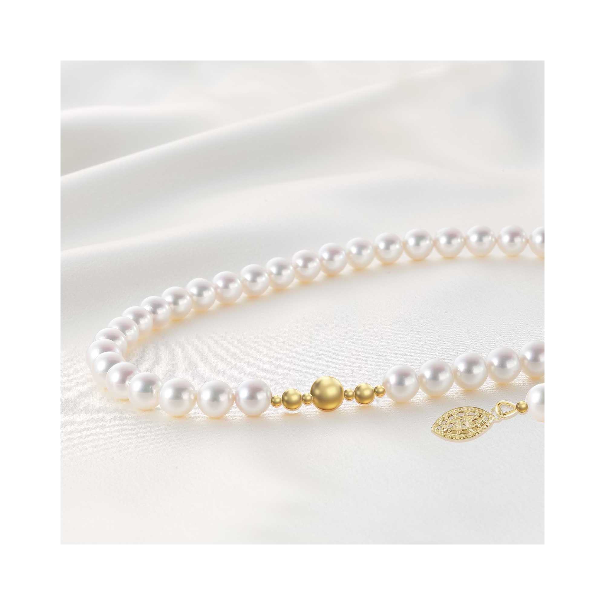 Freshwater cultured pearl and gold necklace- | Mali's Canadian Jewelry Fresh water cultured  pearl and 14 K gold Necklace
Neckla